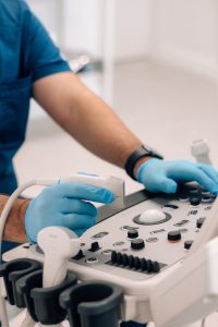 A ultrasound technician uses the machine